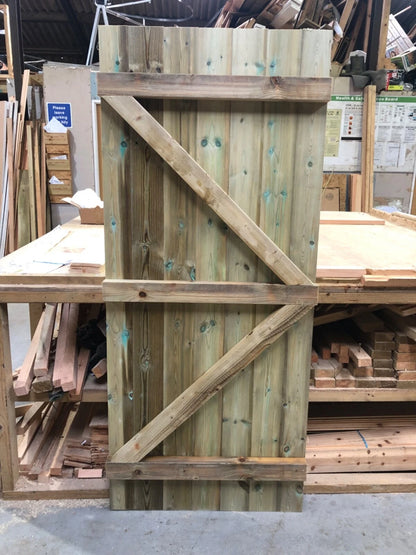 Stack of wooden pallets in a warehouse setting